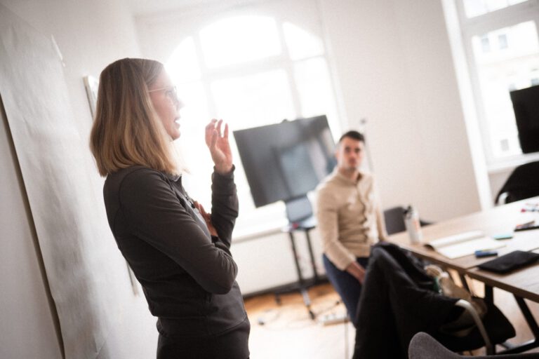Sandra Cameron facilitating a conversation with a workshop participant.